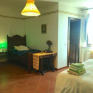 Una cama o camas en una habitación de I Poggetti 31 fotos más