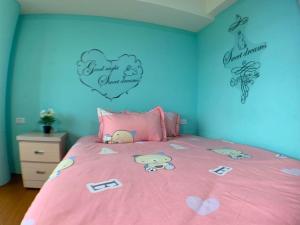 Tempat tidur dalam kamar di 星霖之家
