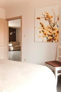 Postel nebo postele na pokoji v ubytování B&B De Fruithoeve