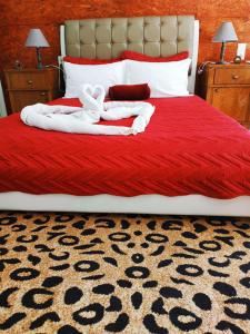Postel nebo postele na pokoji v ubytování Sweet Home Suite