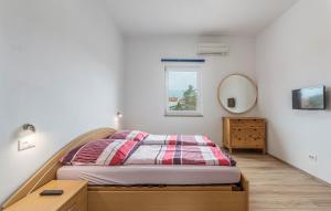 Postel nebo postele na pokoji v ubytování Apart Residence Leko
