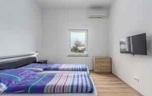 Postel nebo postele na pokoji v ubytování Apart Residence Leko