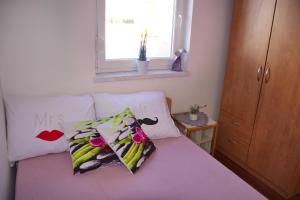 Postel nebo postele na pokoji v ubytování Apartment Olive Garden