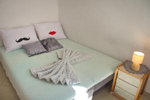 Postel nebo postele na pokoji v ubytování Apartment Olive Garden