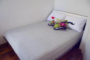 Postel nebo postele na pokoji v ubytování Apartment Olive Garden