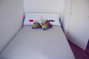 Postel nebo postele na pokoji v ubytování Apartment Olive Garden