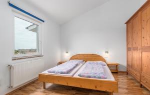 Postel nebo postele na pokoji v ubytování Apart Residence Leko