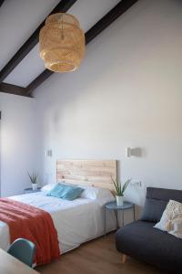 Säng eller sängar i ett rum på Alojamiento rural La Moravieta