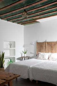 เตียงในห้องที่ Alojamiento rural La Moravieta