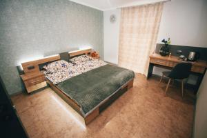 Ein Bett oder Betten in einem Zimmer der Unterkunft 4rooms