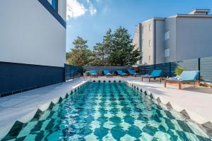 Bazén v ubytování Villa Isola apartments nebo v jeho okolí