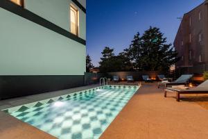 Bazén v ubytování Villa Isola apartments nebo v jeho okolí