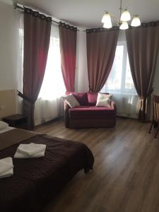 Postel nebo postele na pokoji v ubytování Hotel Karpaty