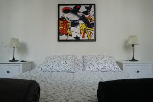 Postel nebo postele na pokoji v ubytování Marquês Modern Art apartment