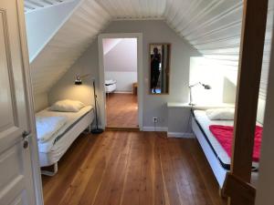 En eller flere senge i et værelse på Fogelbergs TuB