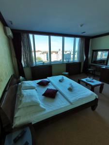 Cama ou camas em um quarto em Panorama Apartman