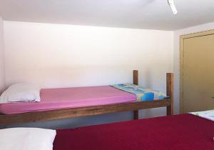 Cama ou camas em um quarto em Hostel Wanderlust