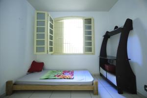 Cama ou camas em um quarto em Hostel Wanderlust