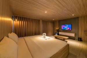 TV a/nebo společenská místnost v ubytování Kontena Hotel