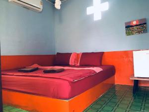 Een bed of bedden in een kamer bij Pai Modern House