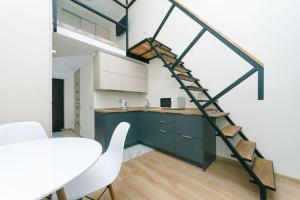 Kuchyň nebo kuchyňský kout v ubytování Apartments SmartHause + 52 fotografií