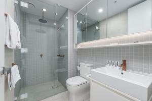 Koupelna v ubytování Domi Serviced Apartments