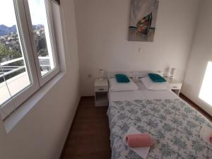 Postel nebo postele na pokoji v ubytování Villa Nika