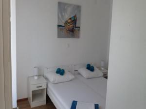 Postel nebo postele na pokoji v ubytování Villa Nika