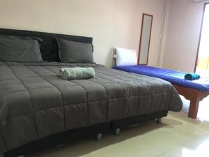 Postel nebo postele na pokoji v ubytování SMILE HOME GUESTHOUSE