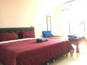 Postel nebo postele na pokoji v ubytování SMILE HOME GUESTHOUSE