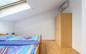 Postel nebo postele na pokoji v ubytování Apart Residence Leko