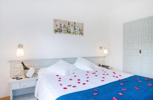 Cama o camas de una habitación en Els Caçadors de Maçanet