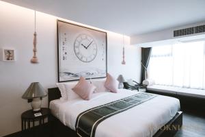 Ένα ή περισσότερα κρεβάτια σε δωμάτιο στο SOOKNIRUND HOTEL