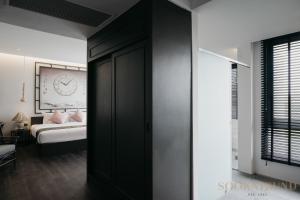 Ένα ή περισσότερα κρεβάτια σε δωμάτιο στο SOOKNIRUND HOTEL