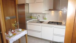 A kitchen or kitchenette at La Bomboniera
