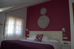 Cama o camas de una habitación en Hotel El Jisu