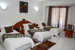 Кровать или кровати в номере Hotel Bouregreg