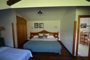 Cama o camas de una habitación en Hotel El Jisu