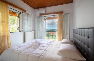 Posteľ alebo postele v izbe v ubytovaní Family Private Homes & Sea View by "elite"