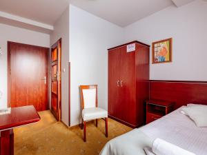Postel nebo postele na pokoji v ubytování Hotel Skalite Spa & Wellness