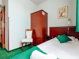 Postel nebo postele na pokoji v ubytování Hotel Skalite Spa & Wellness