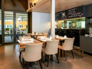 Ein Restaurant oder anderes Speiselokal in der Unterkunft ibis Zurich Adliswil 