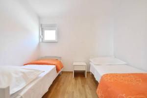 Postel nebo postele na pokoji v ubytování Apartment Jukic