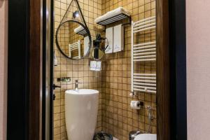 Koupelna v ubytování Hotel Adamo