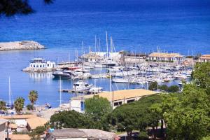 a bunch of boats docked in a harbor at S'O Suites Tropea in Tropea