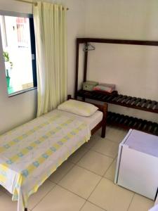 Postel nebo postele na pokoji v ubytování Hotel Pousada Hamburgo