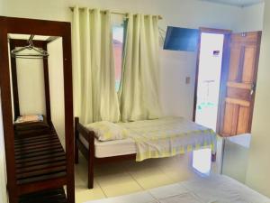 Postel nebo postele na pokoji v ubytování Hotel Pousada Hamburgo