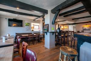 The lounge or bar area at The Plough Inn Ripple 