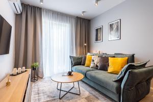 Зона вітальні в Apartamenty Tespis - Francuska Atal Park