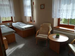 Letto o letti in una camera di Hotel Kralicek